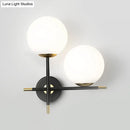 Modern black & gold wall light bedroom milky glass shade