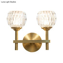 Modern black & gold wall light with dimpled glass for living room