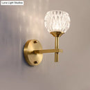 Modern black & gold wall light with dimpled glass for living room
