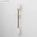 Modern black & gold wall sconce with white glass shade living room