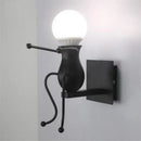 DecorBites™ Cartoon Doll Wall Sconce: Modern Iron Art Light for Kids Room
