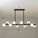 Modern black island ceiling light with frosted globes dining room