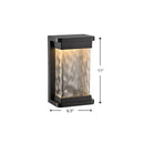 Modern black led outdoor wall sconce with rippled glass cylinder