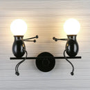 Modern black little man led wall light bedroom figurine sconce