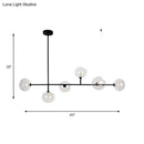 Modern black metal chandelier with glass globes – dining room light