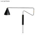 Modern black metal wall lamp with long arm for living room