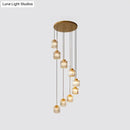 Modern black prismatic crystal cylindrical chandelier stairway light