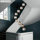 Modern black prismatic crystal cylindrical chandelier stairway light