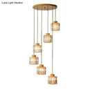 Modern black prismatic crystal cylindrical chandelier stairway light