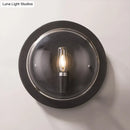 Modern black round wall sconce with e12 bulb for hallway