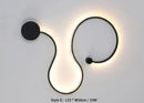 Modern black serpentine led wall sconce for living room decor