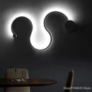 Modern black serpentine led wall sconce for living room decor