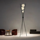 Modern black tripod moon floor lamp with white bulbs living room