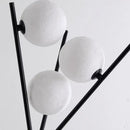 Modern black tripod moon floor lamp with white bulbs living room