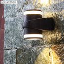 Modern black tubular metal wall washer sconce backyard light