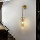 Modern black wall sconce with clear glass and wire mesh stairway light