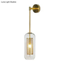 Modern black wall sconce with clear glass and wire mesh stairway light