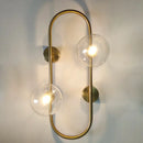 Modern black wall sconce with frosted glass globes – bedroom light