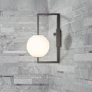 Modern black wall sconce with white glass orb – bedroom light