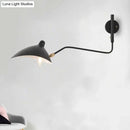 Modern black & white articulated wall sconce living room light fixture