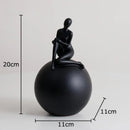 Modern black & white geometric base character statue living room decor