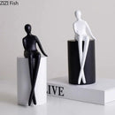 Modern black & white geometric base character statue living room decor