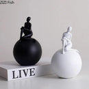 Modern black & white geometric base character statue living room decor