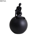 Modern black & white geometric base character statue living room decor