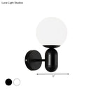 Modern black & white glass wall light – meeting room globe sconce