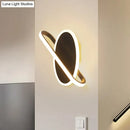 Modern black & white oval led sconce stairway light with warm glow