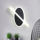 Modern black & white oval led sconce stairway light with warm glow