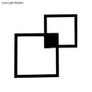 Modern black & white overlapping square acrylic shade wall sconce dining room