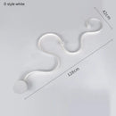 Modern black & white sculptural wall lamps for bedroom decor
