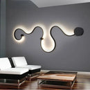 Modern black & white sculptural wall lamps for bedroom decor