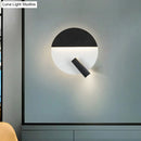 Modern black & white wall sconce with adjustable spotlight – bedroom