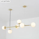 Modern brass 6-bulb island lamp with glass shade for dining rooms