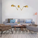 Modern brass adjustable arm wall sconces for bedroom decor