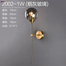 Modern brass and amber decorbites glass ball wall lamp for bedroom