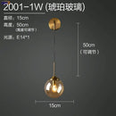 Modern brass and amber decorbites glass ball wall lamp for bedroom