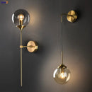 Modern brass and amber decorbites glass ball wall lamp for bedroom