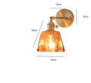 Modern brass and amber glass wall lamp for bedroom living room