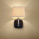 Modern brass and beige linen wall sconce lighting bedroom lamp