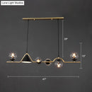 Modern brass and black 3 light hanging island light for dining room