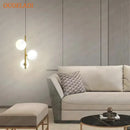 Modern brass and black glass ball pendant light dining room