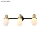 Modern brass and black glass sconce light bedroom wall lamp