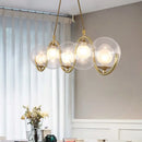 Modern brass and clear glass globe pendant light kitchen fixture