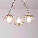 Modern brass and clear glass globe pendant light kitchen fixture