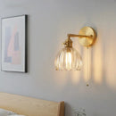Modern brass and clear glass wall lights – bedroom rotating sconce