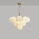 Modern brass and frosted glass chandelier for living room dining decor