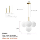 Modern brass and frosted glass chandelier for living room dining decor